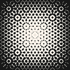 Vector halftone geometric seamless pattern with spots, floral shapes, petals. Graphic monochrome texture with radial gradient transition effect. Abstract repeat background. Modern repeatable design