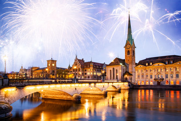 Fototapeta premium scenic view of historic Zurich city center with famous Fraumunster and Grossmunster Churches and river Limmat at Lake Zurich, Canton of Zurich, Switzerland