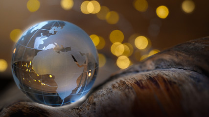 Environment, sustainable earth globe with europe and africa on golden background lights