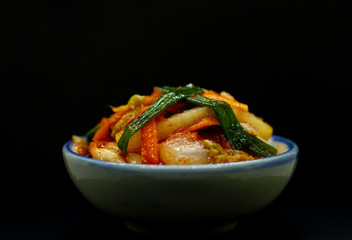 Kimchi is a spicy Korean side dish created from salted fermented vegetables.