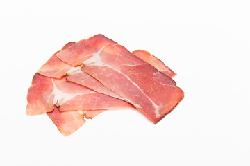 Hamon sliced on white background. Spanisch traditional meat.