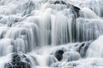 Fototapeta na wymiar Landscape of Bond Falls captured with motion blur, Michigan's Upper Peninsula, USA 