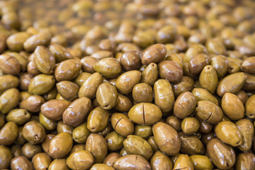 pile of pickled green olives as a background