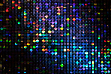 Colorful background from luminous circles on a black background