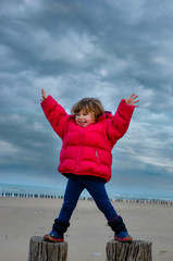 pretty girl on northern beaches in winter