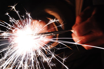 christmas sparkler in hand
