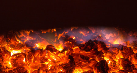 Texture embers closeup. Embers after a fire. - obrazy, fototapety, plakaty