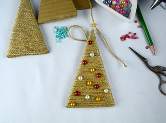 Alternative Christmas tree. Christmas tree made from twine, decorated with beads. Handmade tree.