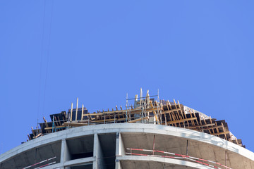 Construction site round shape with classic blue sky background copy space