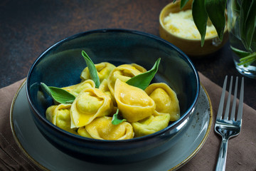 Homemade tortelloni with ricotta and spinach.