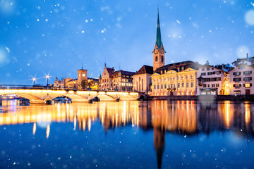 scenic view of historic Zurich city center with famous Fraumunster and Grossmunster Churches and river Limmat at Lake Zurich, Canton of Zurich, Switzerland