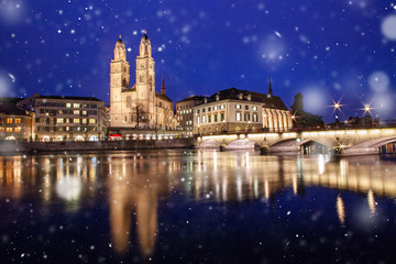 Fototapeta na wymiar scenic view of historic Zurich city center with famous Fraumunster and Grossmunster Churches and river Limmat at Lake Zurich, Canton of Zurich, Switzerland