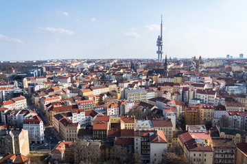 Prague skyline with Zizkov television tower transmitter and Church of Saint Procopius, sunny day, Czech Republic