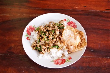 Stir fries Ground pork with chili and Thai hot basil (Thai street food : Pad Kra Praow Moo)