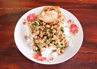 Stir fries Ground pork with chili and Thai hot basil (Thai street food : Pad Kra Praow Moo)