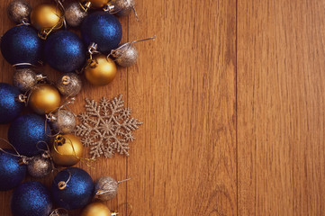 christmas balls on wooden background