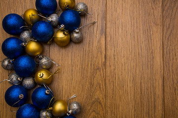 christmas balls on wooden background