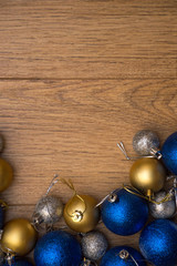 christmas balls on wooden background