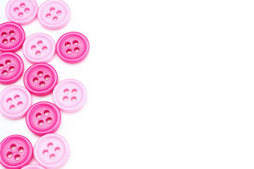 colored bright plastic buttons with a hole