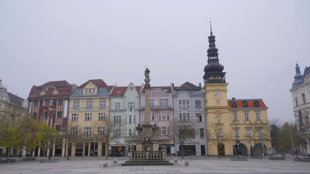 Pan of the beautiful, colorful buildings in the old town of Ostrava city in the Czech Republic in an empty square