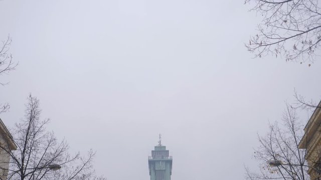 Looking up at the Ostrava New Town Hall building in in the Czech Republic on a grey, foggy day