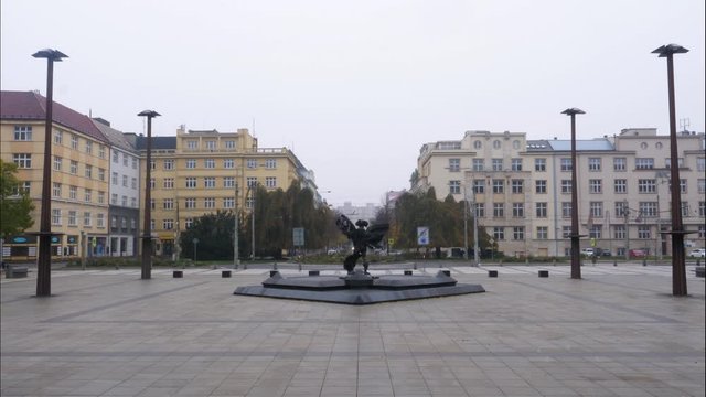 Timelapse of cars driving past the square outside of the New Town Hall in Ostrava in the Czech Republic 