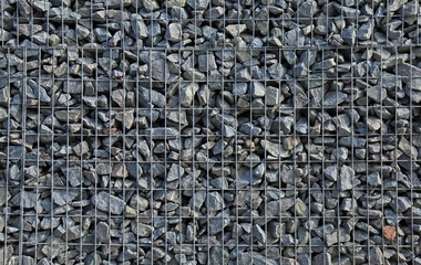 Gabion, texture, background. Gabion net frequent part (design). New technologies in the manufacture of retaining walls and fences. Landscaping. Fencing decorative elements