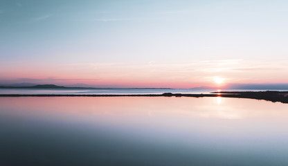 Lake during sunset.