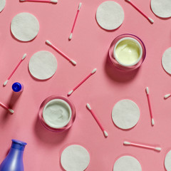 Facial skin care concept. Top view, flat lay beauty background with various facial cosmetic products on background