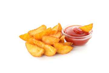 Slices of baked potato wedges, red sauce isolated on white background