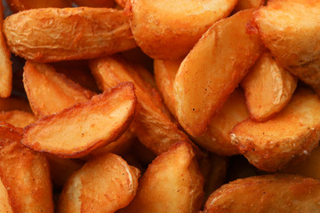 Baked potato wedges textured, space for text. Top view