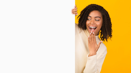 African american girl looking over blank space