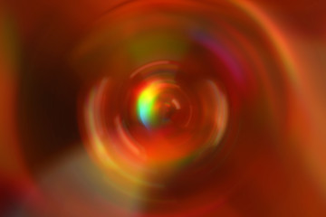 Colorful blurred gradient radial motion background. Orange, green, yellow, red mixed multicolor texture