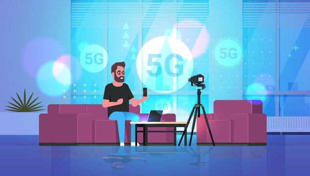 blogger recording video on camera 5G online network wireless systems connection concept fifth innovative generation of high speed internet modern apartment interior full length horizontal vector