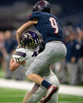 Great action photos of football players making amazing plays during a football game
