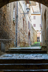 Narrow alley between the old houses