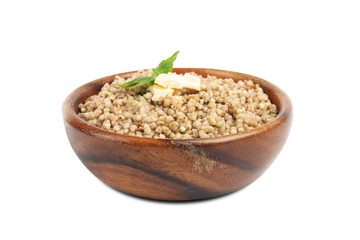 Tasty buckwheat porridge with butter isolated on white