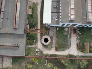 Working lots and a black hole in the earth, industrial roads