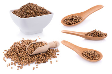 closeup coriander seeds on white background