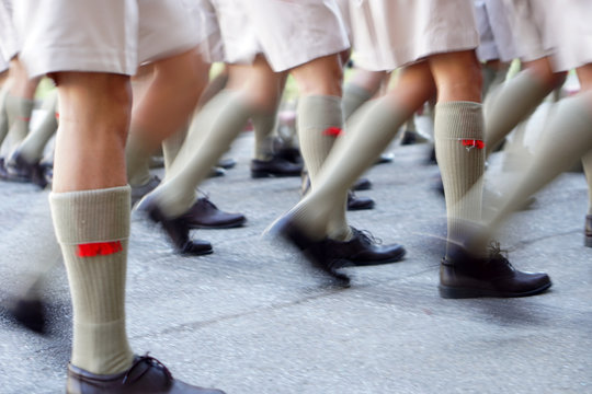 The feet of the Thai Scout marching parade, Motion blur image.
