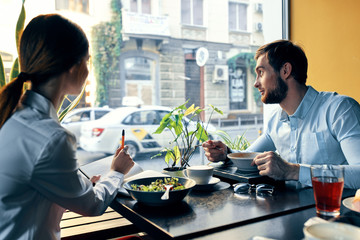 Fototapeta na wymiar young couple in restaurant