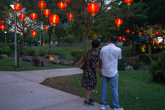 Couple looking at chinese new year decorations