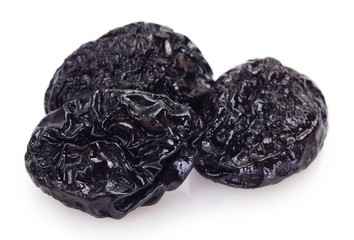 Prunes on white background