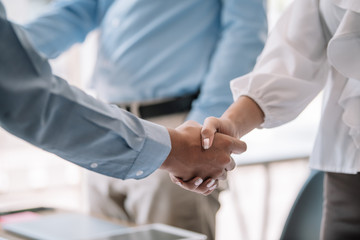 Business people shaking hands congratulations and confirmed the agreement and the investment partner.