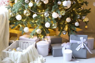 merry christmas card with christmas tree toys decoration presents close up photo on in pink room