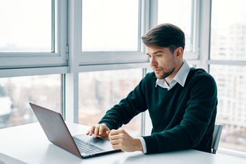 businessman working on laptop in office