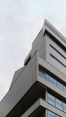building with blue sky and clouds