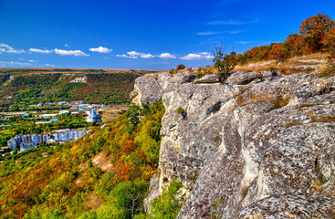 Beautiful autumn landscape with blue sky and colorful trees