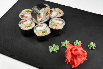 sushi and rolls on slate
