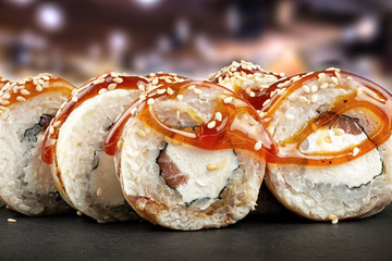 sushi and rolls on slate